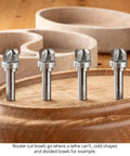 Pro Grade 3 Piece Bowl And Tray Router Bit Set With Half Inch Shank Solid Carbide Heads on wooden tray, showing detailed fluted design.