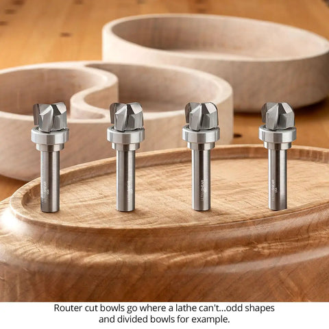 Pro Grade 3 Piece Bowl And Tray Router Bit Set With Half Inch Shank Solid Carbide Heads on wooden tray, showing detailed fluted design.