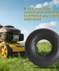 2-Pack 19x7-8 Inner Tubes With Straight Valve Stem next to a lawn tractor in a grassy field