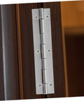 Installed brushed stainless steel piano hinge on a dark wood cabinet door; continuous heavy-duty hinge with screws