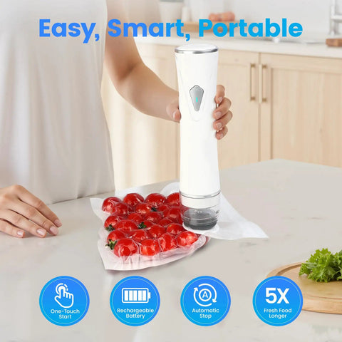 Person using Visible Tank Handheld Food Vacuum Sealer With One Touch Strong Suction, sealing bag of tomatoes, white device on kitchen counter.