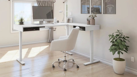 Badass L Shape Standing Desk With Smooth Height Adjustment 72 Inch Wide White And Black Office Workstation in a bright room.