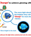 Instructions to charge Glow In The Dark Ocean Wall Decals Set With Sea Life Stickers using lamp or flashlight for glowing effect.