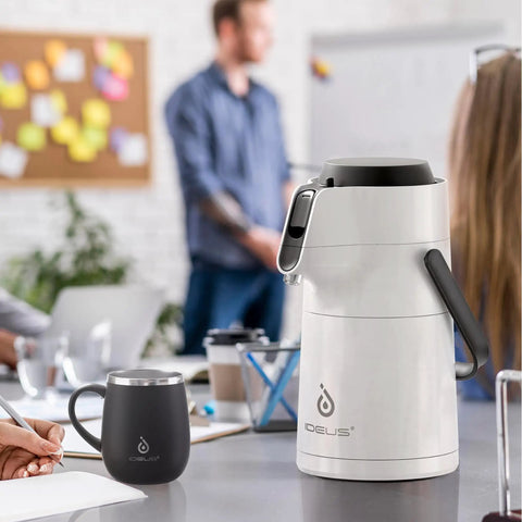 Thermal Coffee Carafe 74oz Stainless Steel Vacuum Insulated Water Jug For Hot Or Cold Beverages on an office table