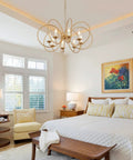 Modern Chandelier With Antique Brass Brush Finish And Geometric Shade, 8 Gold Ring Pendant Light Fixture in bedroom setting