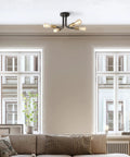 4 Light Adjustable Socket Semi Flush Mount Ceiling Light In Matte Black With Matte Brass Accents Exposed E26 Base Pivot Joints Industrial Sputnik Style Fixture For Modern Living Rooms And Hallways above sofa