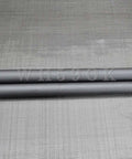 Two One Piece 3K Carbon Fiber Tube 28x26mm for drones and aircraft, glossy or matte finish, laying parallel on a textured surface.