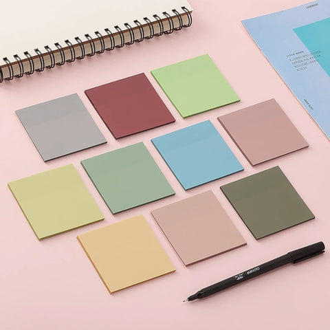 Colorful sticky notes with notebook and pen, not the Transparent Sticky Notes Set With 12 Pads And 600 Sheets See Through 3 By 3 Inch Self Adhesive Notes For Bible Journaling And Studying Water Resistant Easy To Peel And Clean Removal.
