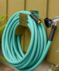 10 Inch Frost Free Sillcock Outdoor Faucet With Chrome Plated Brass Body Half Inch PEX Inlet To Three Quarter Inch Male Hose Thread Outlet Lead Free Built For Year Round Use And No Freeze Drama In Your Yard installed with coiled garden hose