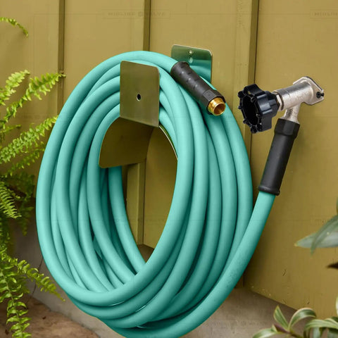 10 Inch Frost Free Sillcock Outdoor Faucet With Chrome Plated Brass Body Half Inch PEX Inlet To Three Quarter Inch Male Hose Thread Outlet Lead Free Built For Year Round Use And No Freeze Drama In Your Yard installed with coiled garden hose