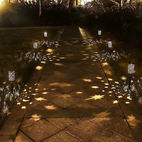 Pathway lit by Six Pack Solar Outdoor Lights For Garden Pathway And Patio Bronze Lanterns With Moon And Star Designs Waterproof Hanging Lights
