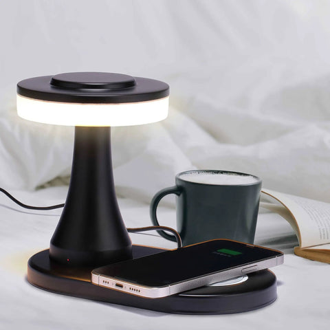 Rechargeable LED Table Lamp With Wireless Charging Pad Dimmable Night Light For Bedroom Patio Nursery Or Restaurant Ambience Cozy Vibes Portable USB Cable Included Black with phone charging and mug nearby