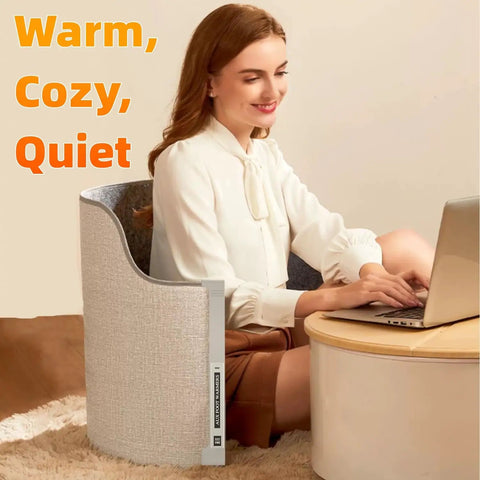 Woman using laptop with Under Desk Electric Foot Warmer For Office And Home Quiet Portable Cozy Feet Warmer, gray cylinder