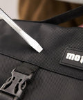 Close-up of the roll pouch from 64 Piece Motorcycle Tool Kit With Roll Pouch For Harley Davidson And All Models Built To Tackle Any Trail Or Street Ride Includes Long Pattern Wrench Set Spark Plug Socket Metric Hex Keys Star Keys And More Universal SAE Metric Sockets Ride Ready