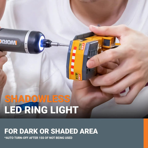 4V Lithium Cordless Screwdriver Kit With 30 Piece Accessory Pack in use on toy with LED light feature in dark area