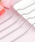 66 Foot Stainless Steel Ball Chain Kit 4.5mm Bead Chain With 100 Connectors And Pliers for blinds and DIY against pink background