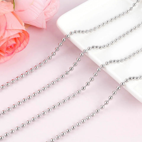 66 Foot Stainless Steel Ball Chain Kit 4.5mm Bead Chain With 100 Connectors And Pliers for blinds and DIY against pink background