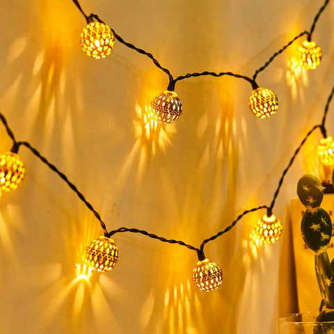 Solar Powered Globe String Lights Outdoor 60 LED 36 Ft With 8 Modes Warm White Waterproof Fairy Lights glowing indoors