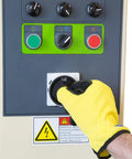 Operator using control panel on Heavy Duty Turntable Pallet Stretch Wrapper Equipped With Powered Pre Stretch Motor And Dual Spiral Wrapping Modes.