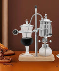Slick Vintage Balance Syphon Coffee Maker Set featuring heavy duty stainless steel and borosilicate glass with coffee brewing.