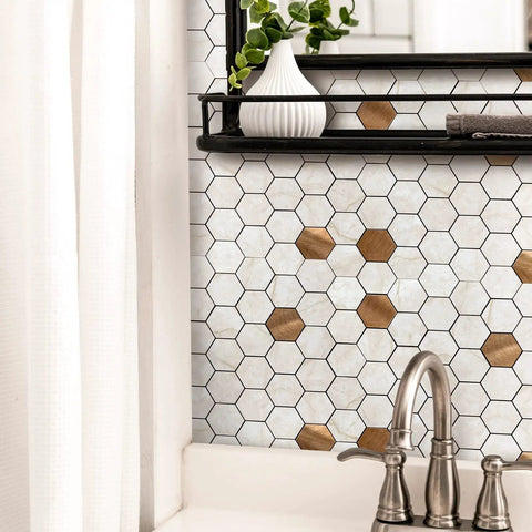 10 Pack Peel And Stick Hexagon Backsplash Tiles In Cream Marble Brushed Copper Metal Look For Kitchen And Bath installed behind sink