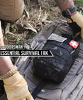 Person placing 250 Piece Survival First Aid Kit IFAK EMT MOLLE Pouch on a backpack in an outdoor setting