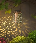 2 Pack Outdoor Solar Lanterns With Hanging Lights Waterproof Metal Sun Moon Star Pattern In Gold Finish Patio Porch Yard Backyard Table Garden Decor Solar Powered Garden Lights For Warm Ambience illuminating garden