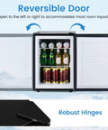 Compact 2.1 Cu Ft Upright Freezer With Reversible Door And Adjustable Thermostat For Dorms And Apartments showing reversible door and robust hinges.