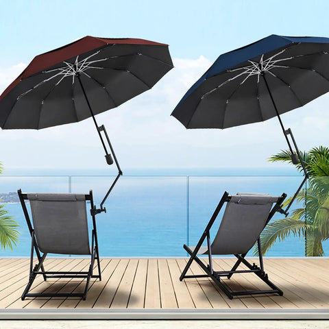 A Zero Stress UV Defense This Upf Fifty Plus Golf Umbrella Packs A Heavy Duty Universal Clamp And Fluid Tilt Arm, angled over deck chairs.