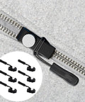 6-Piece Zipper Repair Kit with Removable Heads for Luggage, Bags, Backpacks and Clothes shown on a grey fabric zipper