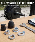 Heavy Duty Electric Bike Hub Motor Axle Nut Kit M12 Front Lock Nut Secure Washers and Durable Cover on wood table.