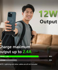 Grab And Go Mini Portable Charger Packing Sleek Built In Usb C Cable Plug Right Into Device No Tangled Cords To Deal With Pocket Sized Power Bank For Daily Grinds And Weekend Rides held by man showing fast charge stats.