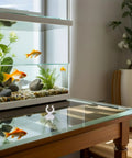 Ditch The Hassle And Get These 50pcs White Aquarium Air Hose Clamps With Rock Solid Suction Cups on a table by a fish tank.