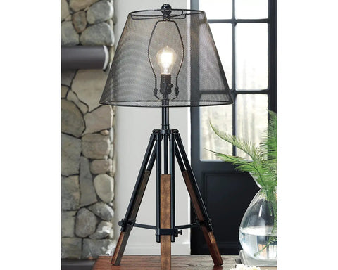 Leolyn Urban Industrial Tripod Table Lamp With Adjustable Height Wire Mesh Shade Black And Brown Finish on desk near window