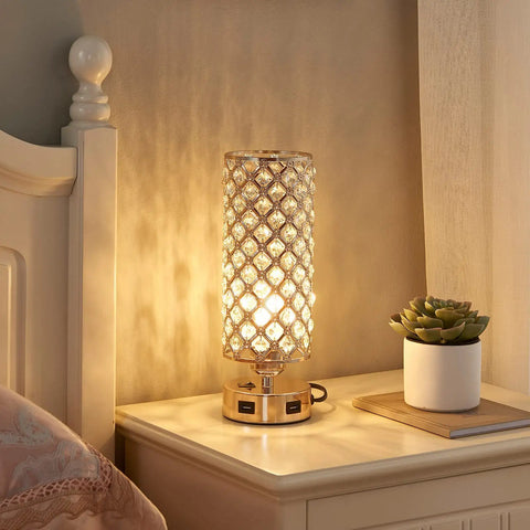 Gold Crystal Bedside Lamp with 130 K9 Crystals and Dual USB Charging Ports on nightstand, warm ambient glow