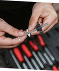 Hands assembling a Heavy Duty Stainless Steel T Track Clamping Bolt with ergonomic star knob from the pack.