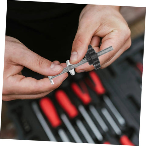 Hands assembling a Heavy Duty Stainless Steel T Track Clamping Bolt with ergonomic star knob from the pack.