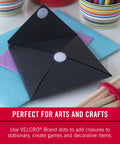 Heavy Duty Adhesive Hook And Loop Dots For Smooth Surfaces Medium Black 3/4 Inch Circles 200 Pack on black envelope for crafts.
