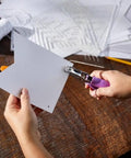 Person using One Sixteenth Inch Circle Hole Punch With Ergonomic Cushioned Grip for crafting on thick paper