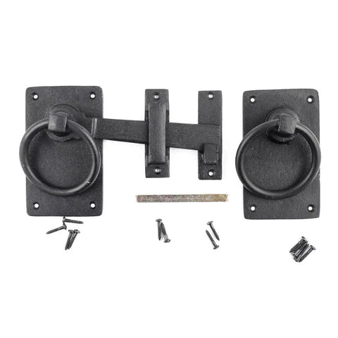 Black Wrought Iron Gate Ring Turn Latch Lock Set 6.5 Inch Wide Reversible Barn Door Catch with screws and mounting hardware.