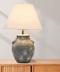 Grey Terracotta Table Lamp With Distressed Sculptural Base And Linen Shade, 23 Inch Tall, Rustic Modern Home Decor on wooden surface