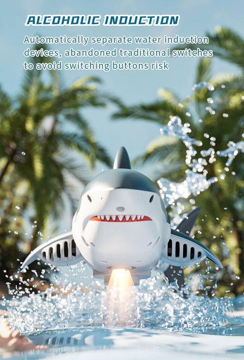 Lit Remote Control Shark Boat With HD Camera Water Sprayer shown mid-air above water amidst palm trees
