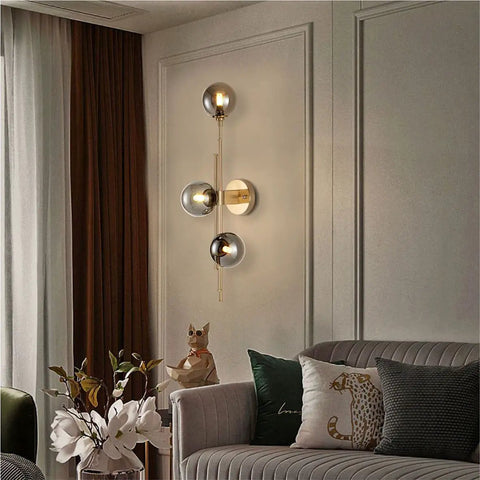 Mid Century Modern Indoor 3 Light Globe Wall Sconce With Smoke Gray Glass Shade and Brushed Brass Finish Vertical Vanity Lamp