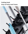 Close-up of folding hooks on Sturdy Stainless Steel Floor Standing Mop Holder And Broom Rack, Easy To Install.