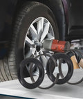 Professional Grade Impact Wrench Retainer Ring Kit With Sealed O Rings Two Pack displaying O-rings near pneumatic tool on vehicle.