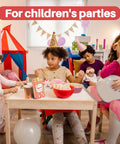 Children's party scene with kids in costumes, eating popcorn from red striped 100 Disposable Popcorn Bags 1oz Paper Bags For Popcorn And Kernels Mini Containers Perfect For Movie Nights Halloween Christmas Carnival Games Party Supplies And Popcorn Machine Accessories, with a tent in the background and balloons.