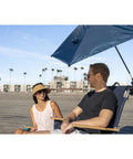 Versa Brella Midnight Blue Outdoor Shade Umbrella with clamp on chair, shading couple at the beach, 1 pack rugged canopy cover.