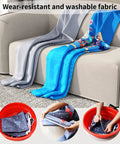 Straight Up Portable Closet Wardrobe System Backed By A Heavy Duty Foldable Garment Rack With Dual Hanging Rods And Ample Storage Shelves To Keep Your Daily Threads Clean with colorful washable fabric on a sofa.