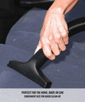 Hand using Powerful 5 Gallon Wet Dry Shop Vacuum With 3 Peak HP Motor, Compact Yet Mighty For Home DIY Cleanup, on seat