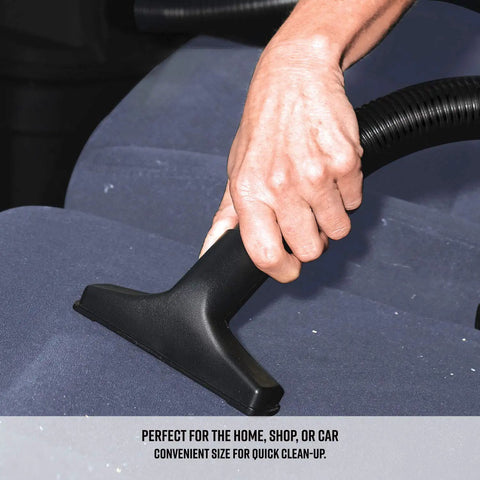 Hand using Powerful 5 Gallon Wet Dry Shop Vacuum With 3 Peak HP Motor, Compact Yet Mighty For Home DIY Cleanup, on seat